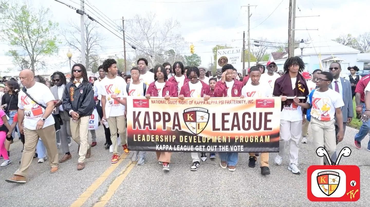 Kappa League members marching in a leadership development program